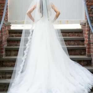 Selling a used wedding dress, worn once.